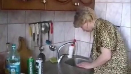 Russian moms Irina - having sex in the kitchen